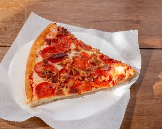 Pepperoni Sausage Chicago Pan Pizza.